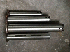 Excavator bucket shaft